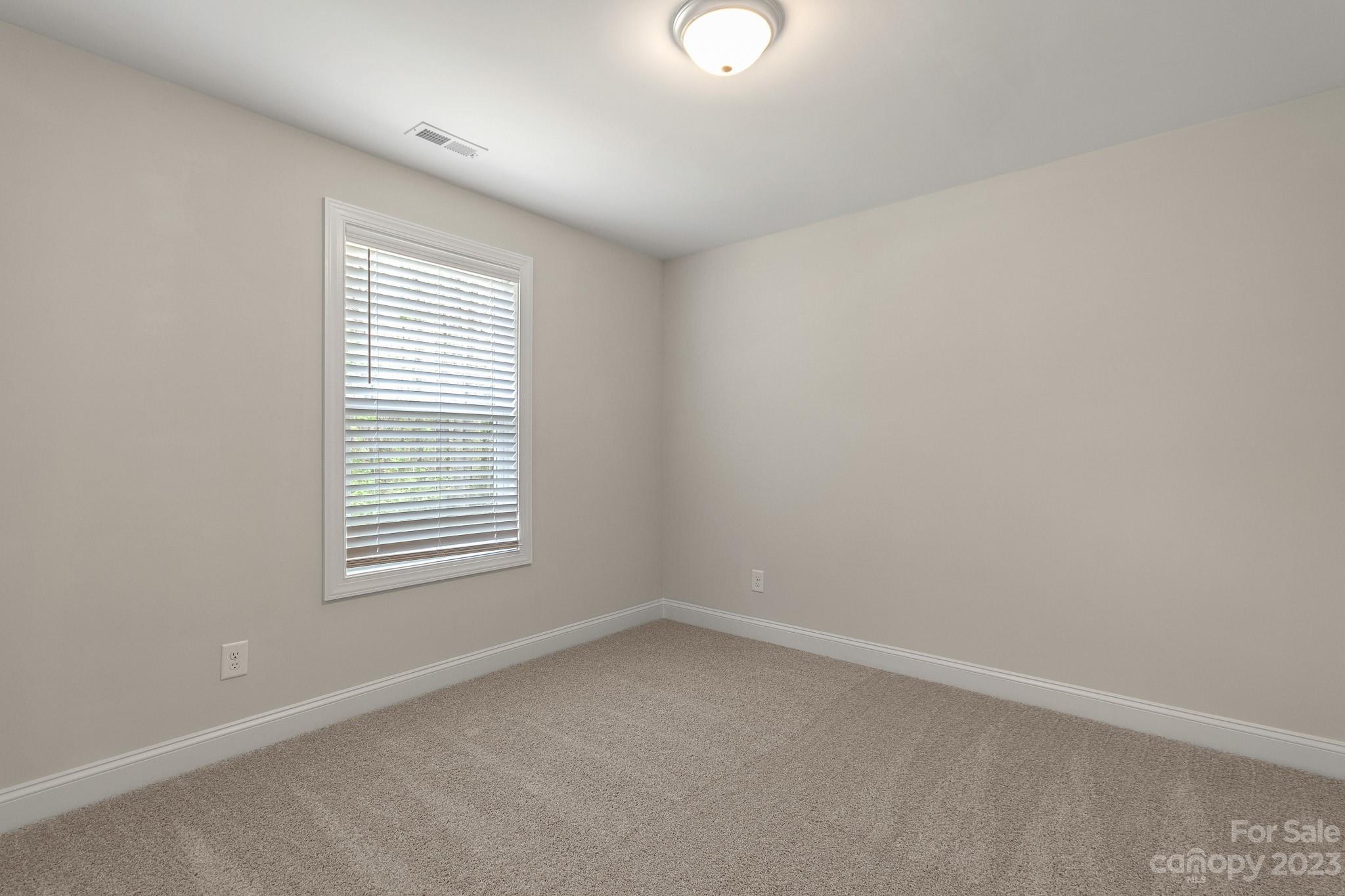 318 Springhill Lane Maiden, NC 28650 - Photo 35 of 40 an empty room with a window