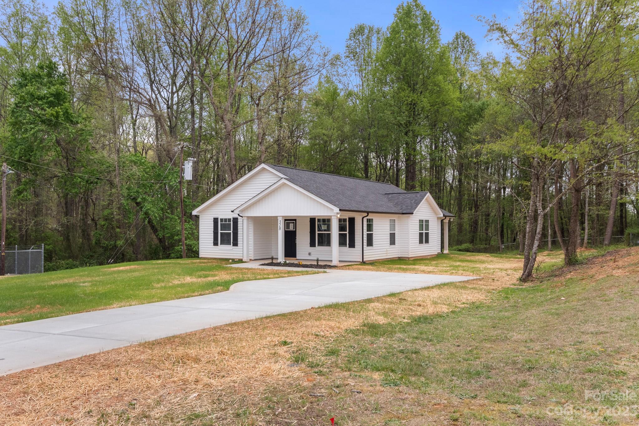 318 Springhill Lane Maiden, NC 28650 - Photo 37 of 40 a front view of a house with a yard