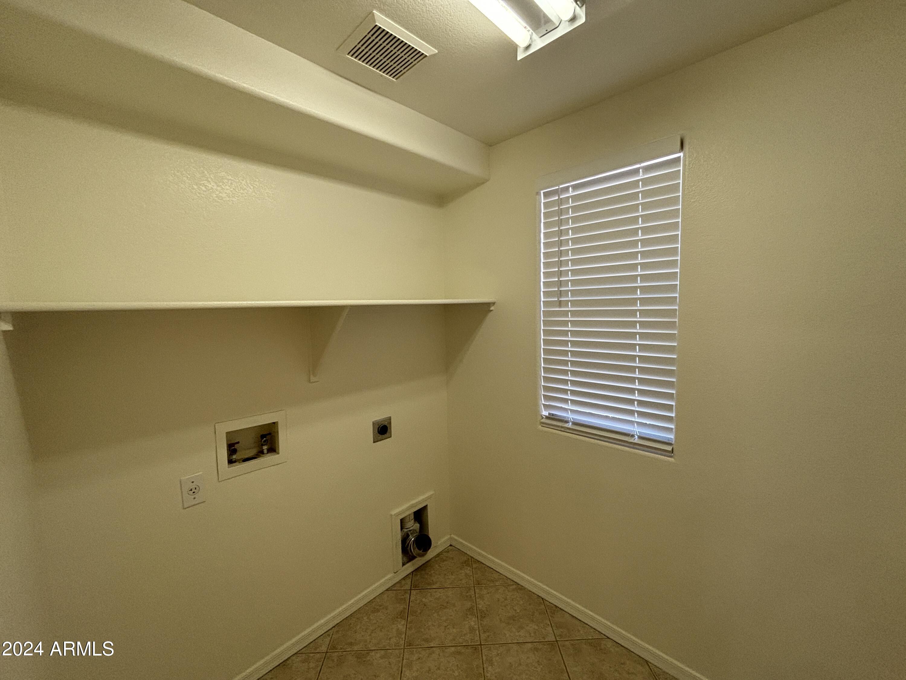 4115 East Rustler Way Gilbert, AZ 85297 - Photo 9 of 31 I