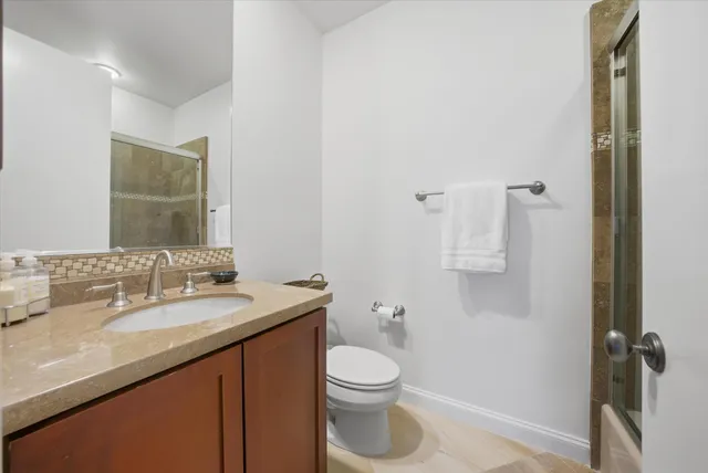 a living room with furniture and natural light