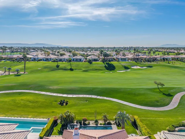 a view of a golf course with a garden
