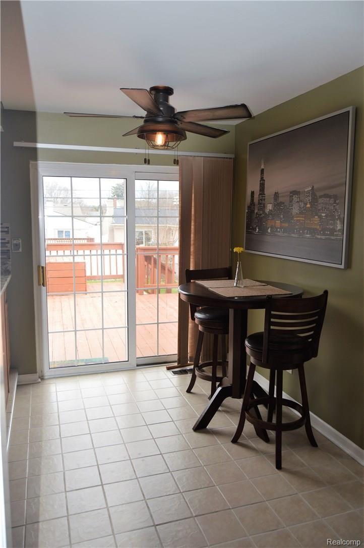 39976 Koppernick Road Canton, MI 48187 - Photo 6 of 16 Breakfast area with doorwall to the deck and backyard