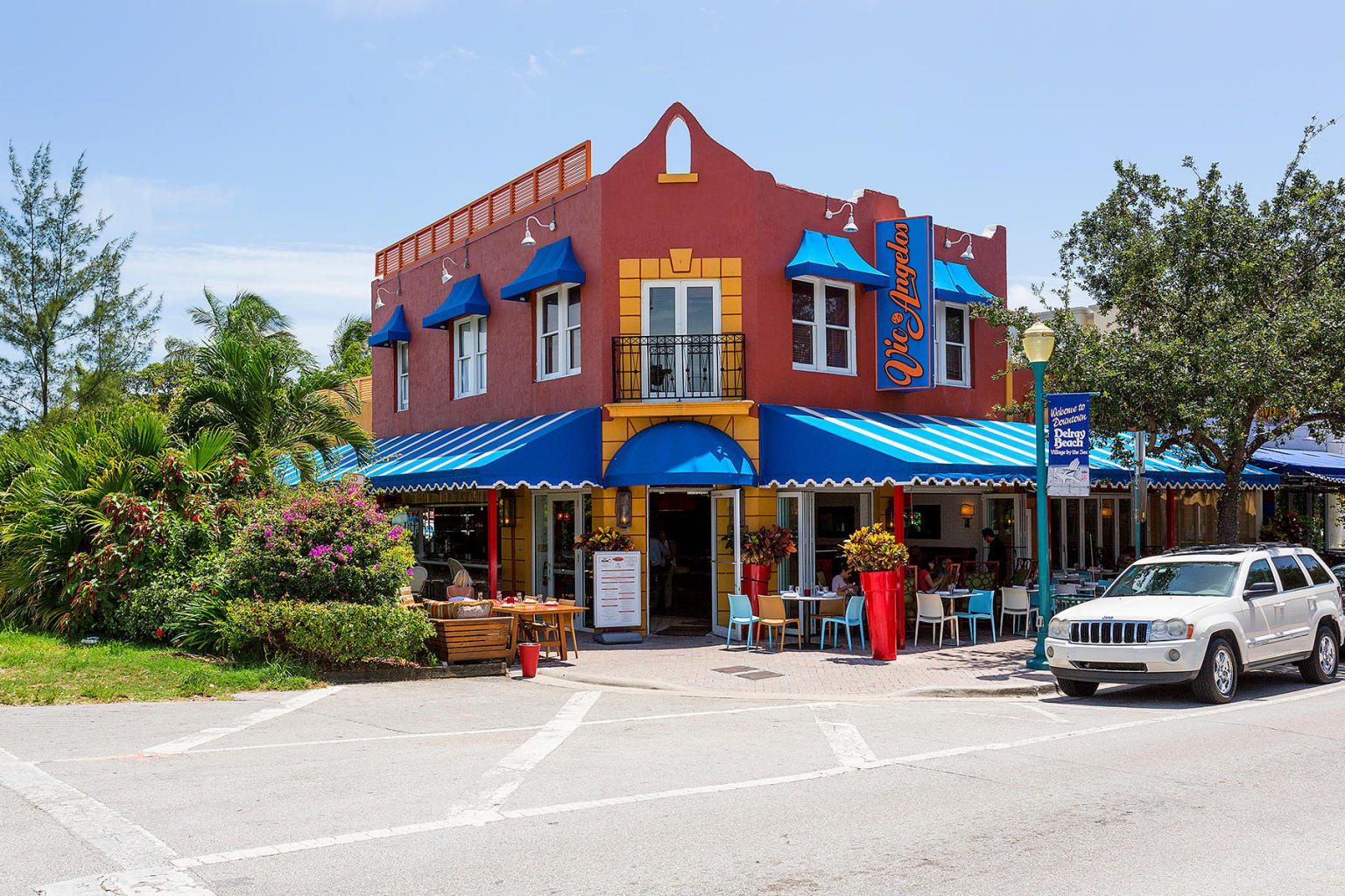 16055 Sims Road, Unit 102 Delray Beach, FL 33484 - Photo 50 of 60 a view of street with cars parked in front of it