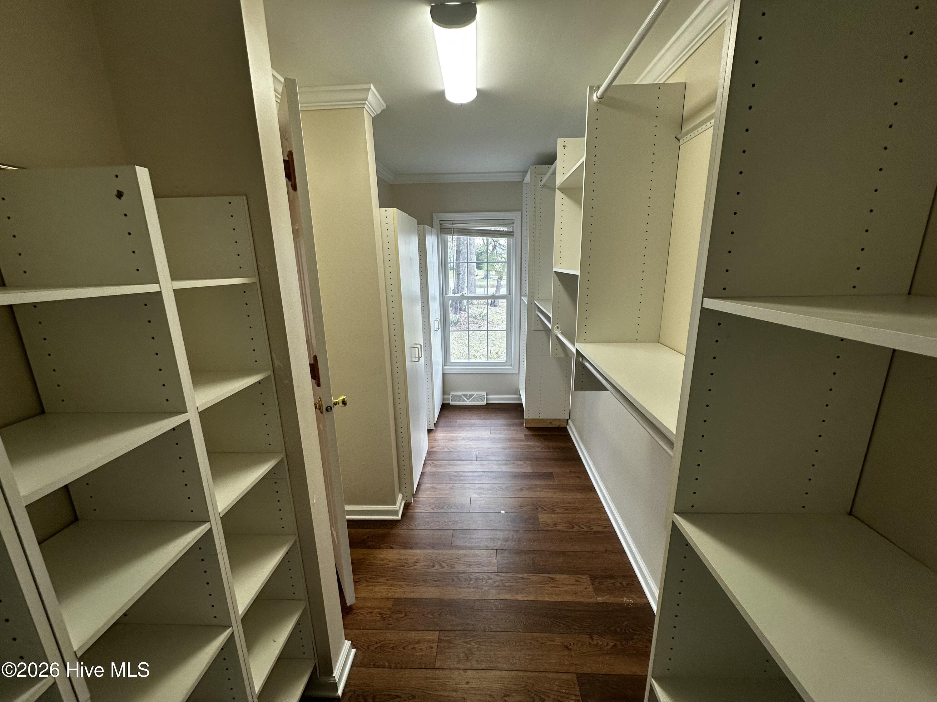 209 Old Ironsides Road Newport, NC 28570 - Photo 31 of 52 Master Bedroom walk in closet