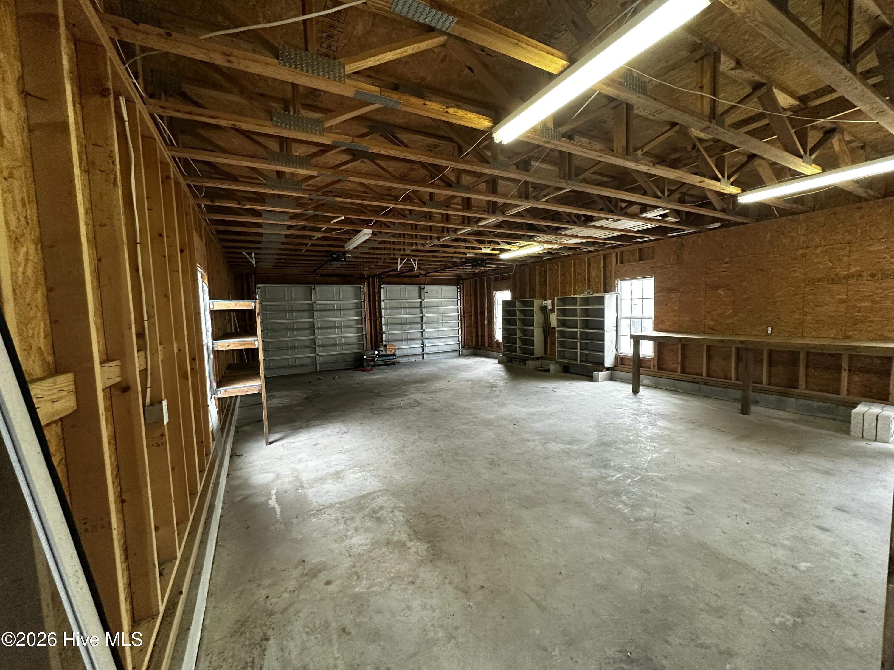 209 Old Ironsides Road Newport, NC 28570 - Photo 41 of 52 Detached garage with two garage doors installed