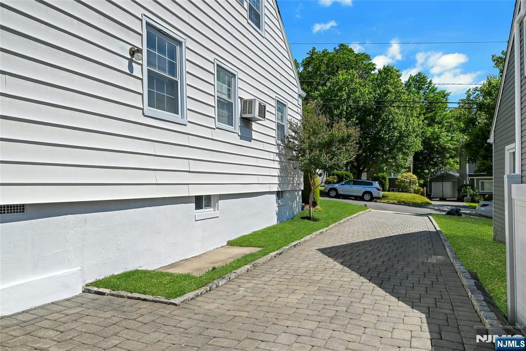 85 Edison Street Clifton, NJ 07013 - Photo 28 of 28 a view of a backyard with a garden