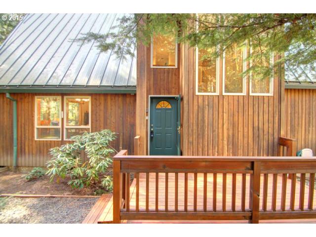 70385 East Zig Zag River Road Rhododendron, OR 97049 - Photo 2 of 16 a view of porch with a small yard