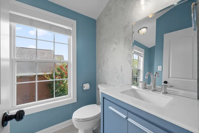 a view of a balcony with wooden floor