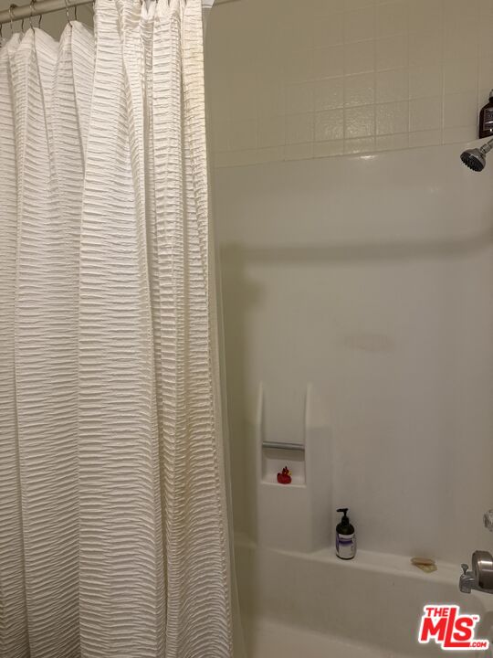 8163 Redlands Street, Unit 1 Playa del Rey, CA 90293 - Photo 5 of 7 a bathroom with a bathtub and shower