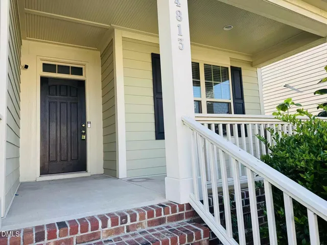 a view of a balcony with stairs