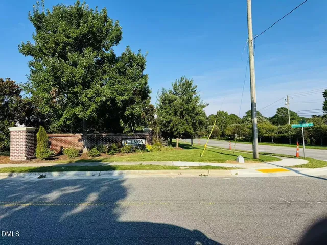 a view of a swimming pool with a yard