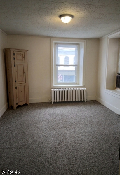 41 Bridge Street Frenchtown, NJ 08825 - Photo 5 of 17 an empty room with a empty space and windows