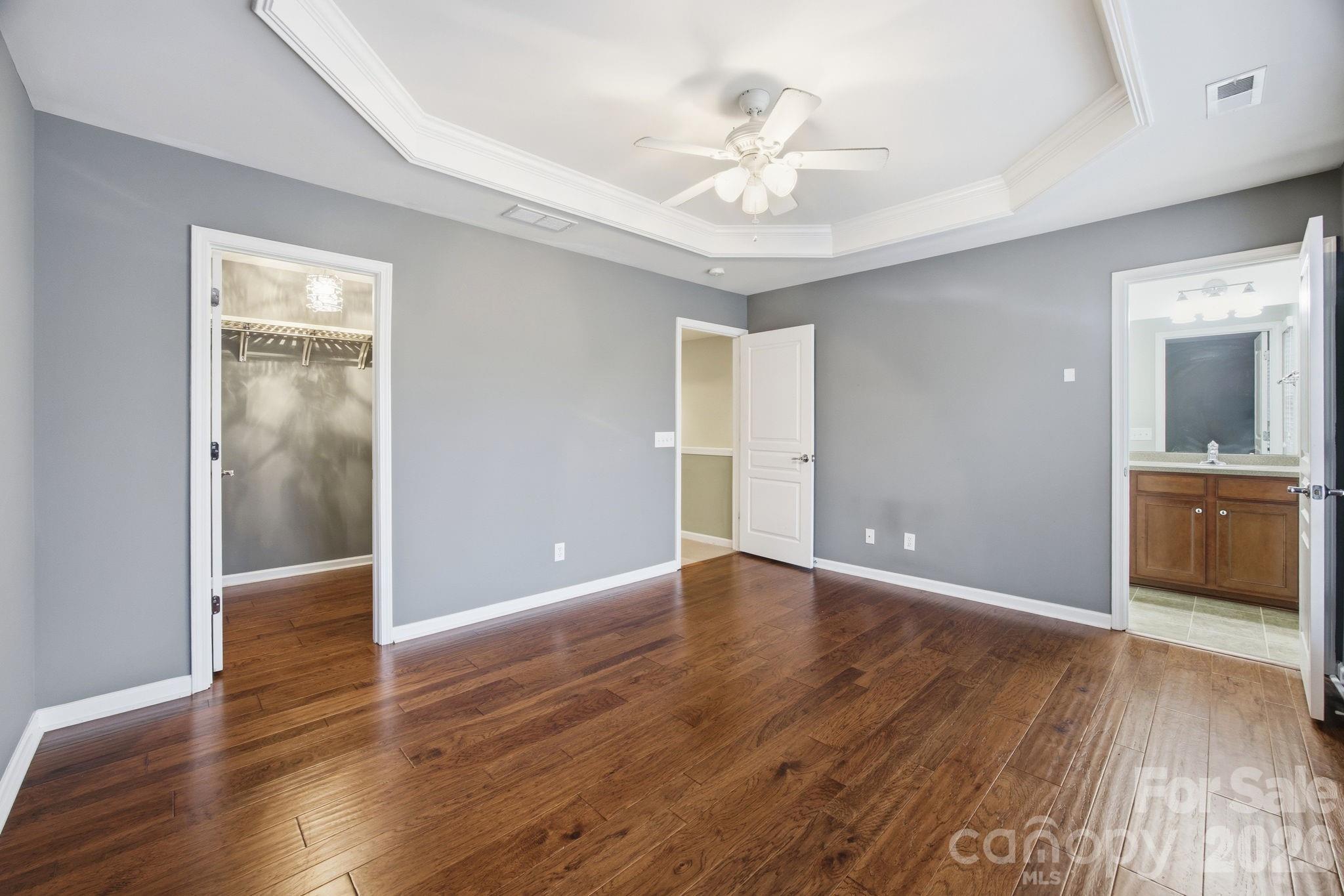 645 6th Baxter Crossing Fort Mill, SC 29708 - Photo 12 of 32 a view of an empty room with wooden floor