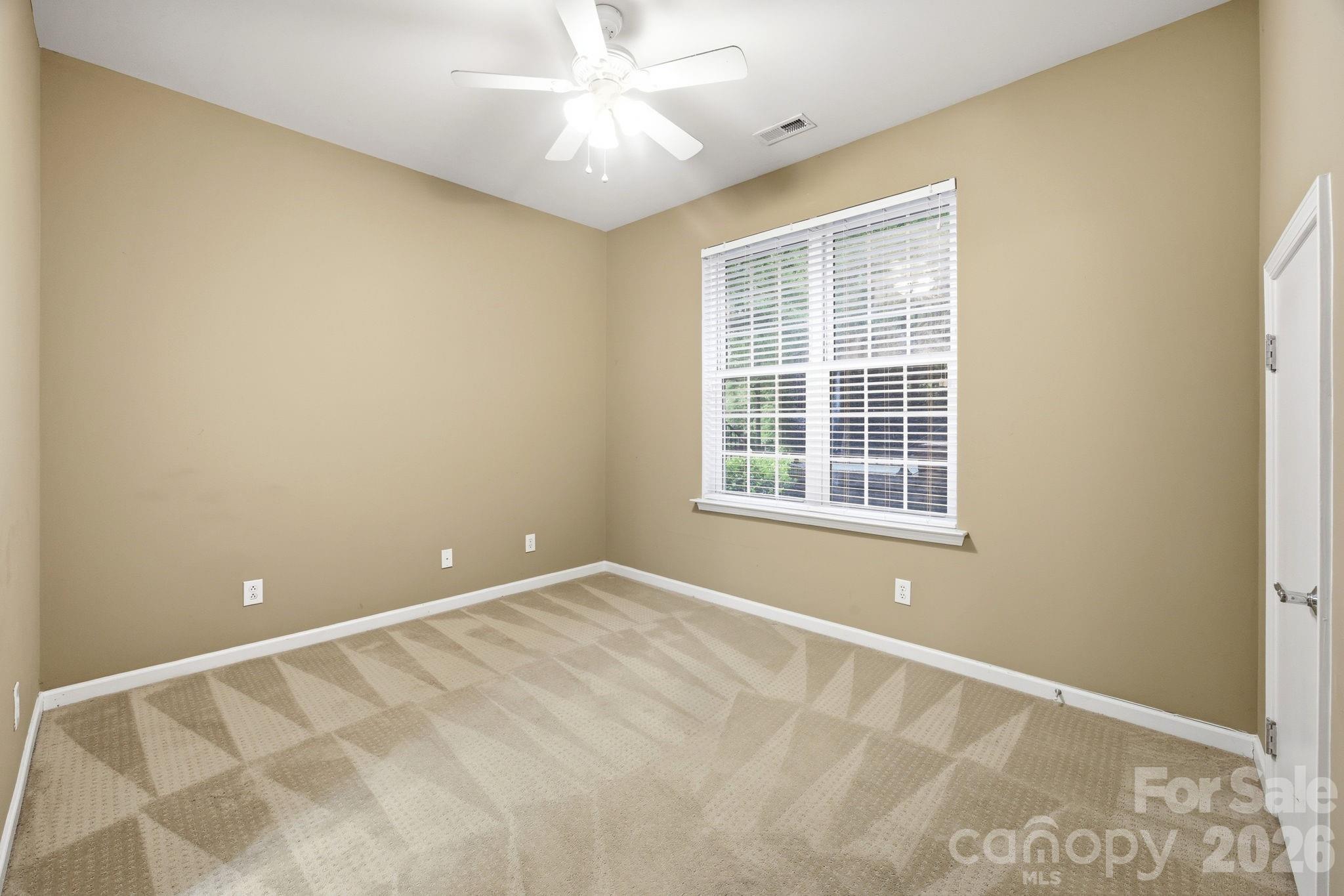 645 6th Baxter Crossing Fort Mill, SC 29708 - Photo 20 of 32 a view of an empty room with a window