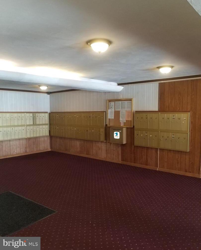9250 Edwards Way, Unit 207A Hyattsville, MD 20783 - Photo 3 of 11 Lobby area - mailboxes