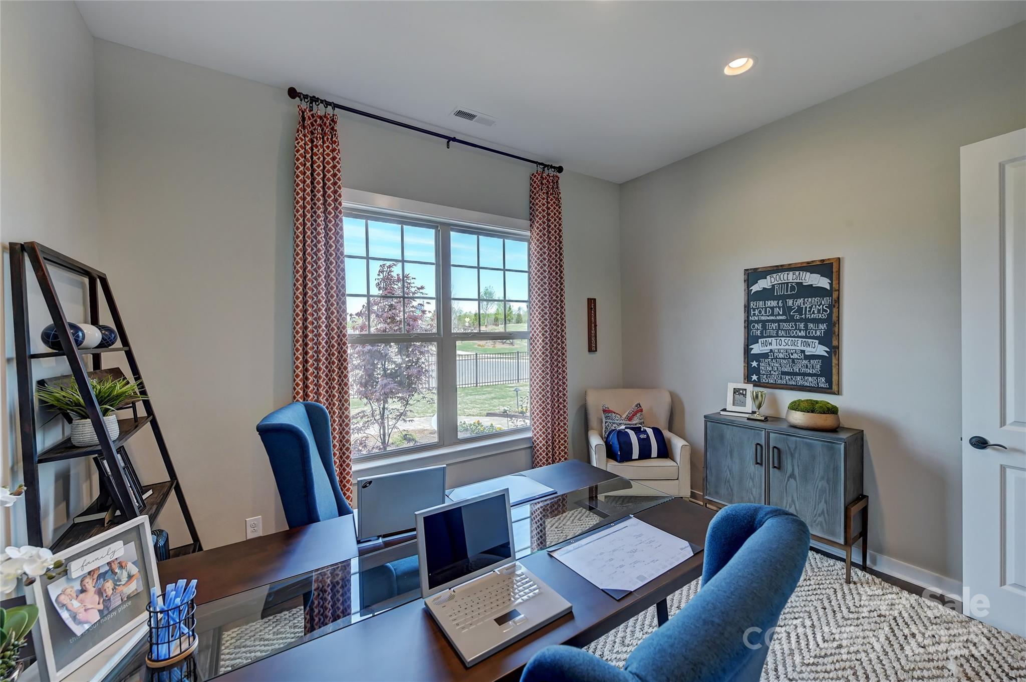 1475 Hubert Graham Way Tega Cay, SC 29708 - Photo 11 of 27 a living room with furniture and a window