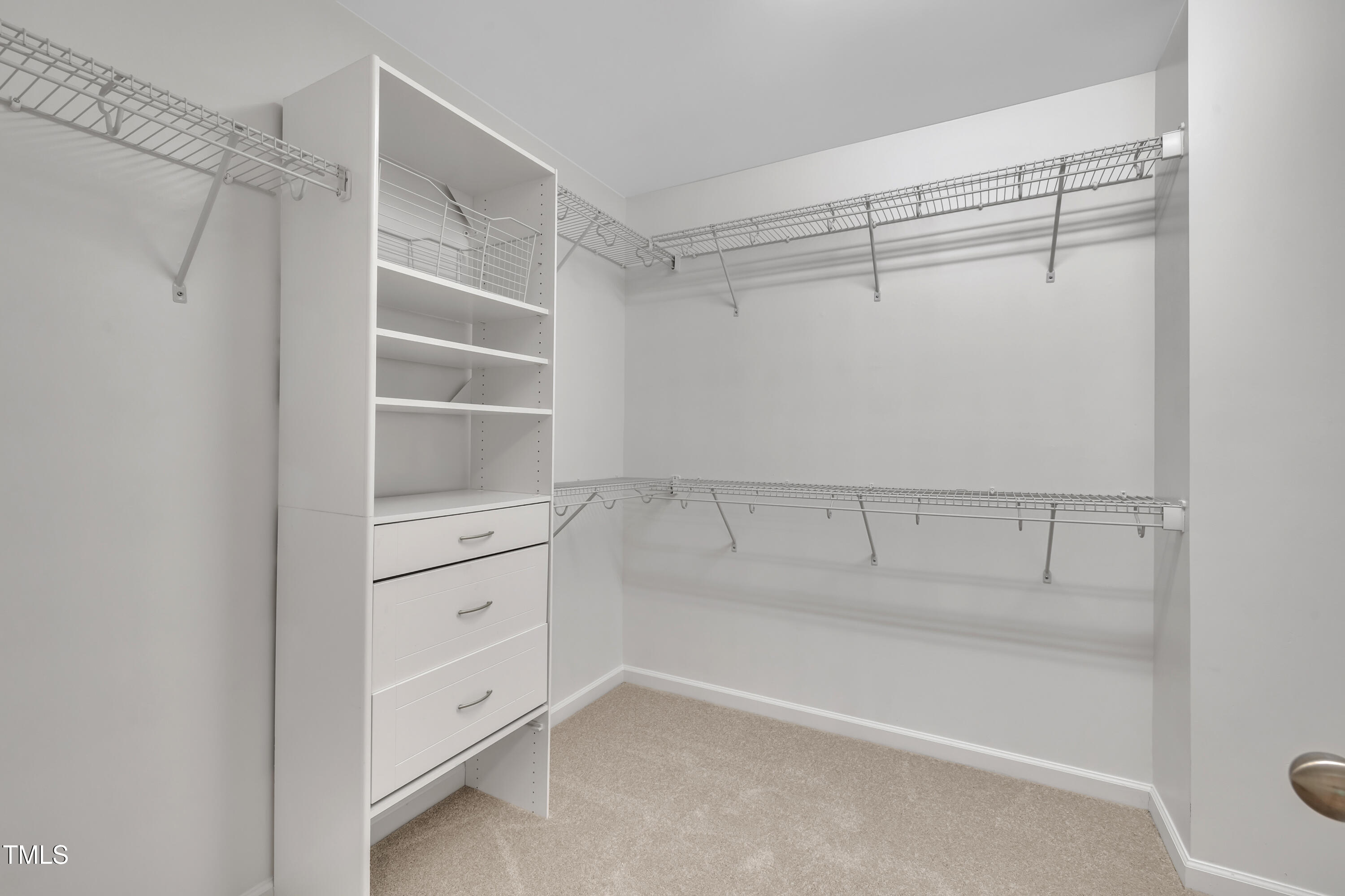 2073 Weston Green Loop Cary, NC 27513 - Photo 34 of 52 a view of an empty walk in closet