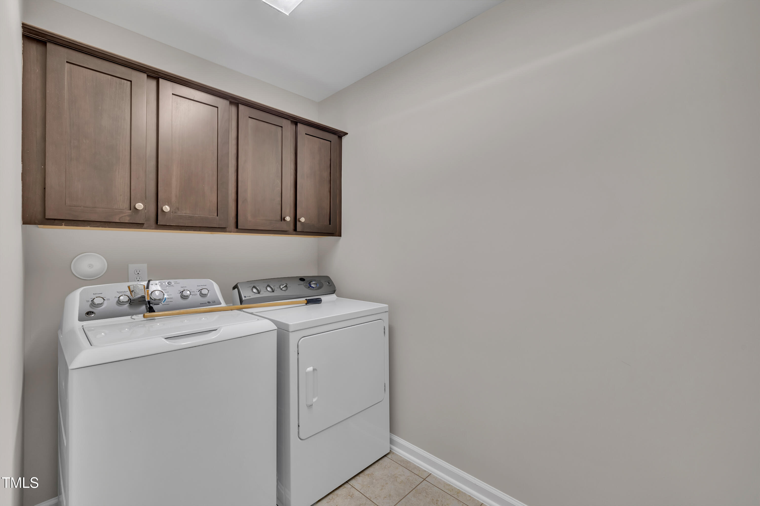 2073 Weston Green Loop Cary, NC 27513 - Photo 35 of 52 a utility room with dryer and washer