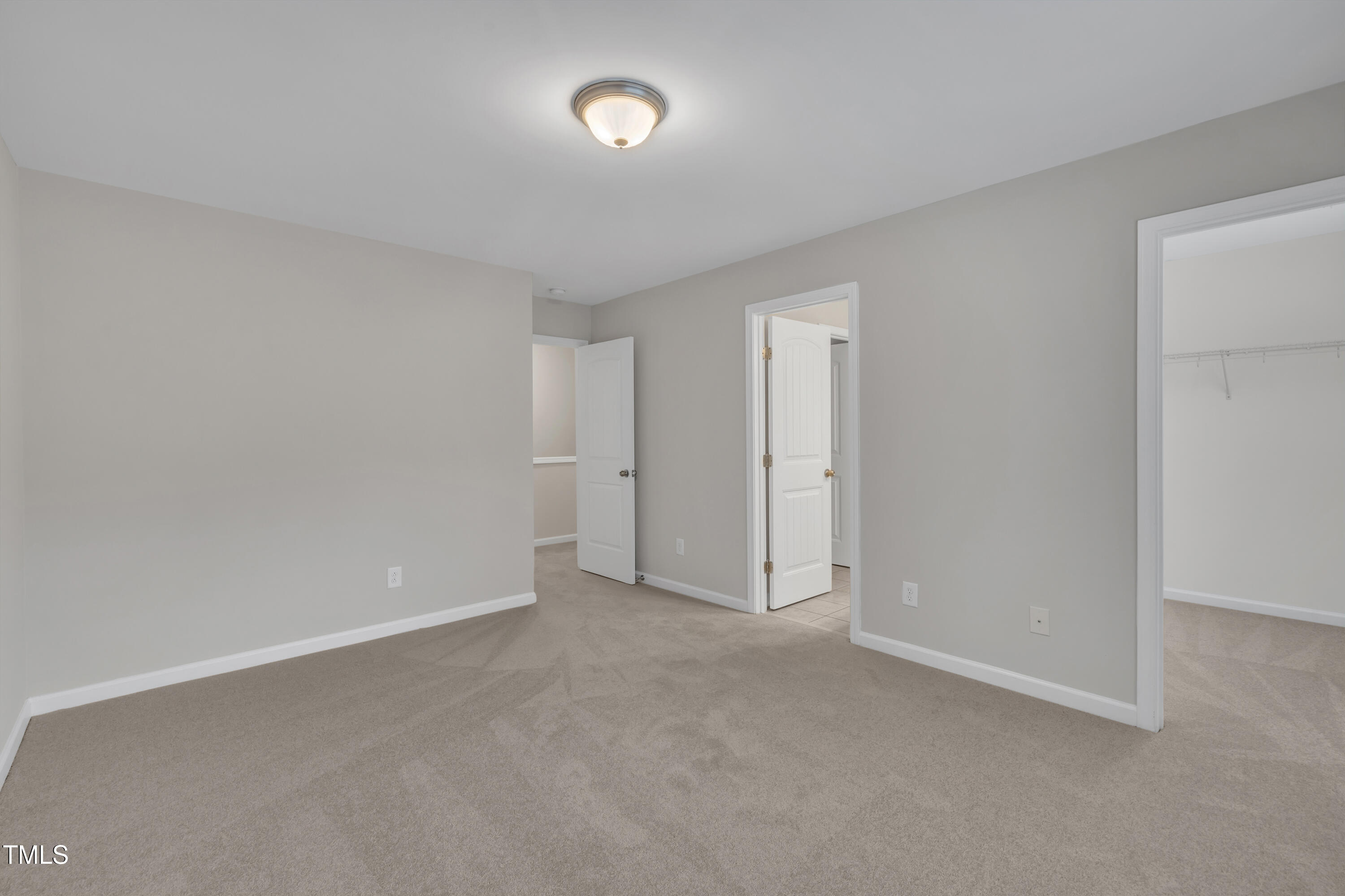 2073 Weston Green Loop Cary, NC 27513 - Photo 37 of 52 a view of an empty room and a window