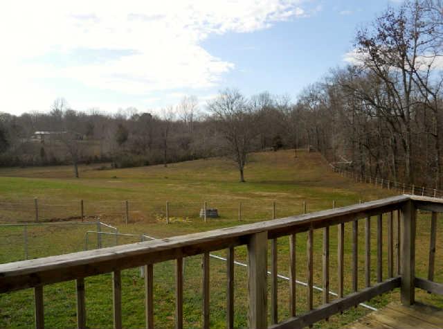7852 Tatum Road Lyles, TN 37098 - Photo 1 of 19 Deck over looking pasture.