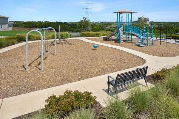 an aerial view of a house with outdoor space