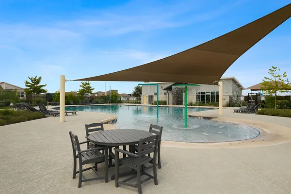 a front view of a house with yard