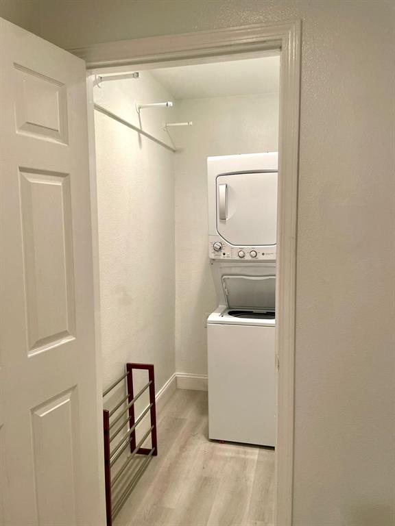 307 East Mitchell Street, Unit F Arlington, TX 76010 - Photo 8 of 15 a utility room with dryer and washer