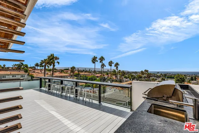 a view of a balcony with city view