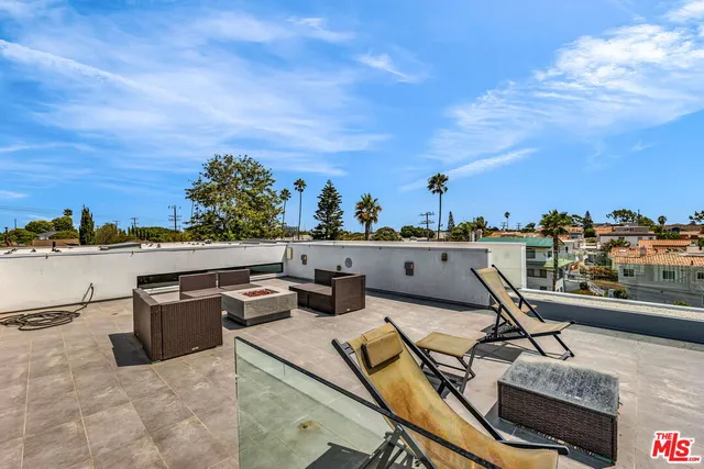 a view of a terrace with chairs