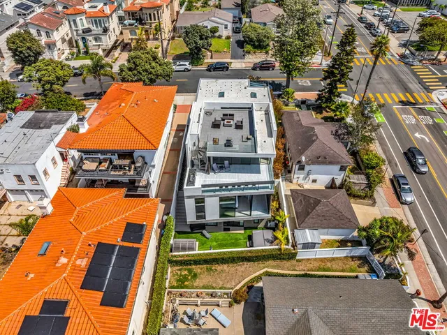 an aerial view of a multi story residential apartment building