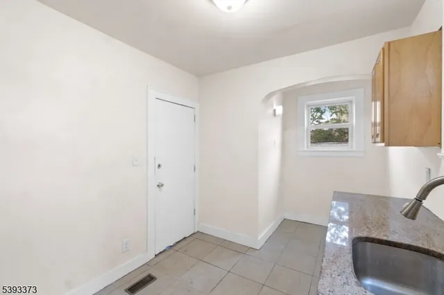 a view of a hallway with closet