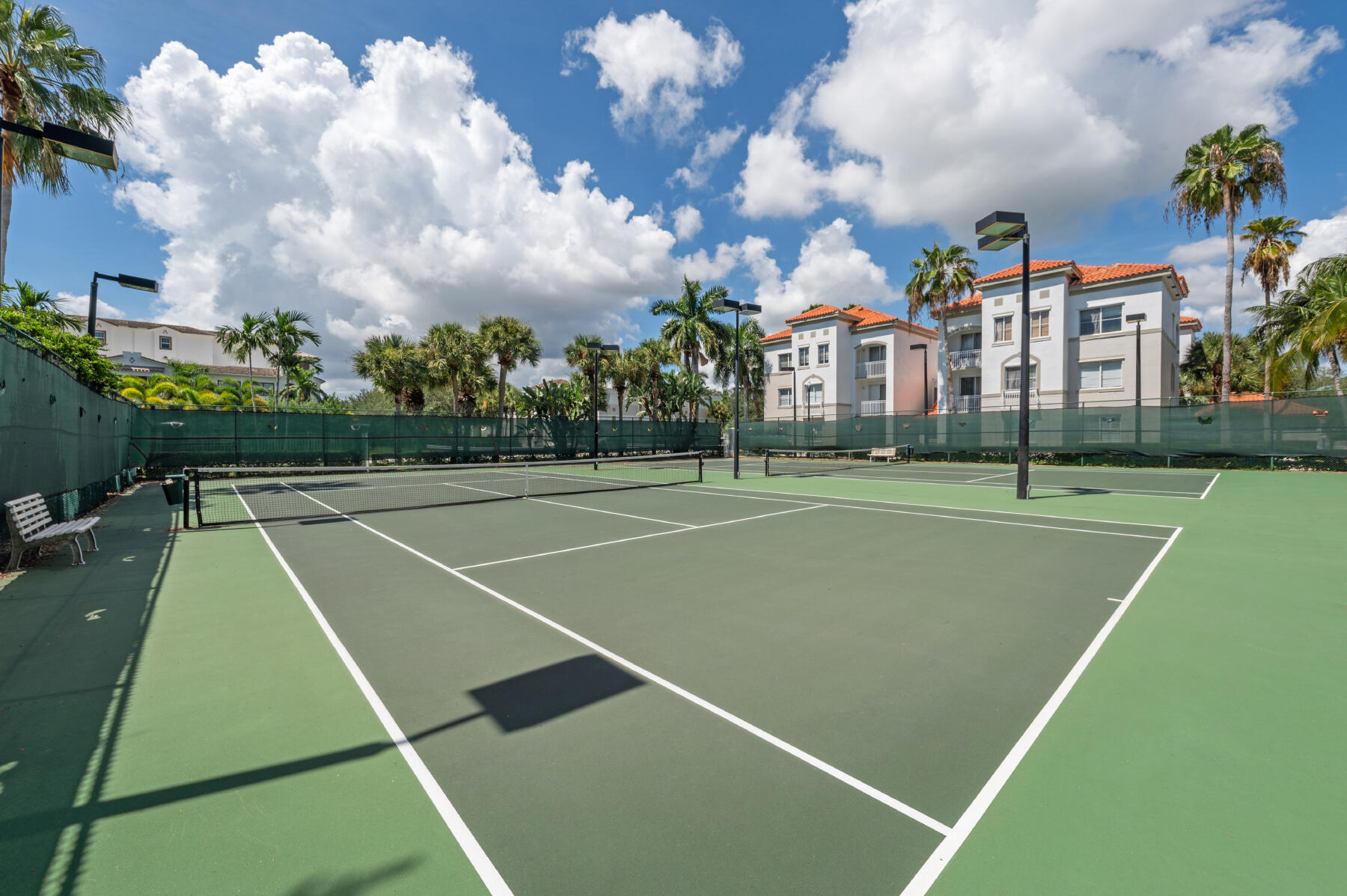 11022 Legacy Drive, Unit 101 Palm Beach Gardens, FL 33410 - Photo 15 of 16 a view of a tennis court