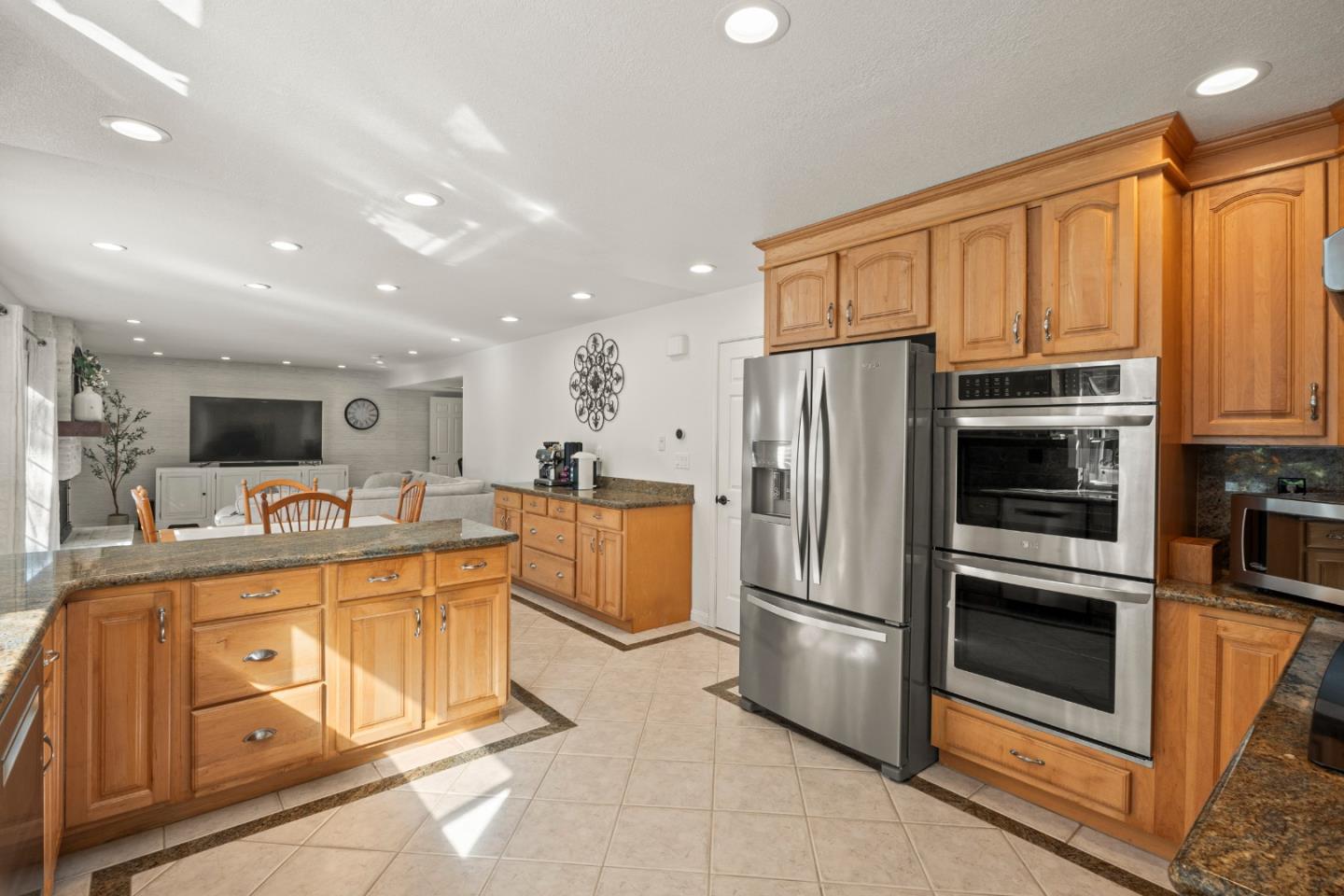 26 Seminole Court San Ramon, CA 94583 - Photo 11 of 51 a kitchen with stainless steel appliances a refrigerator and a stove top oven