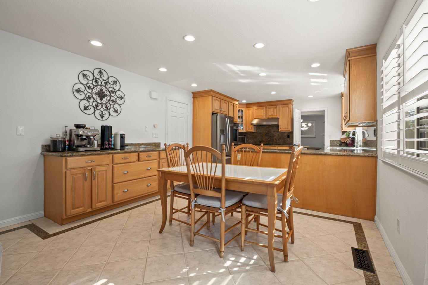 26 Seminole Court San Ramon, CA 94583 - Photo 16 of 51 a kitchen with stainless steel appliances kitchen island granite countertop a sink and cabinets
