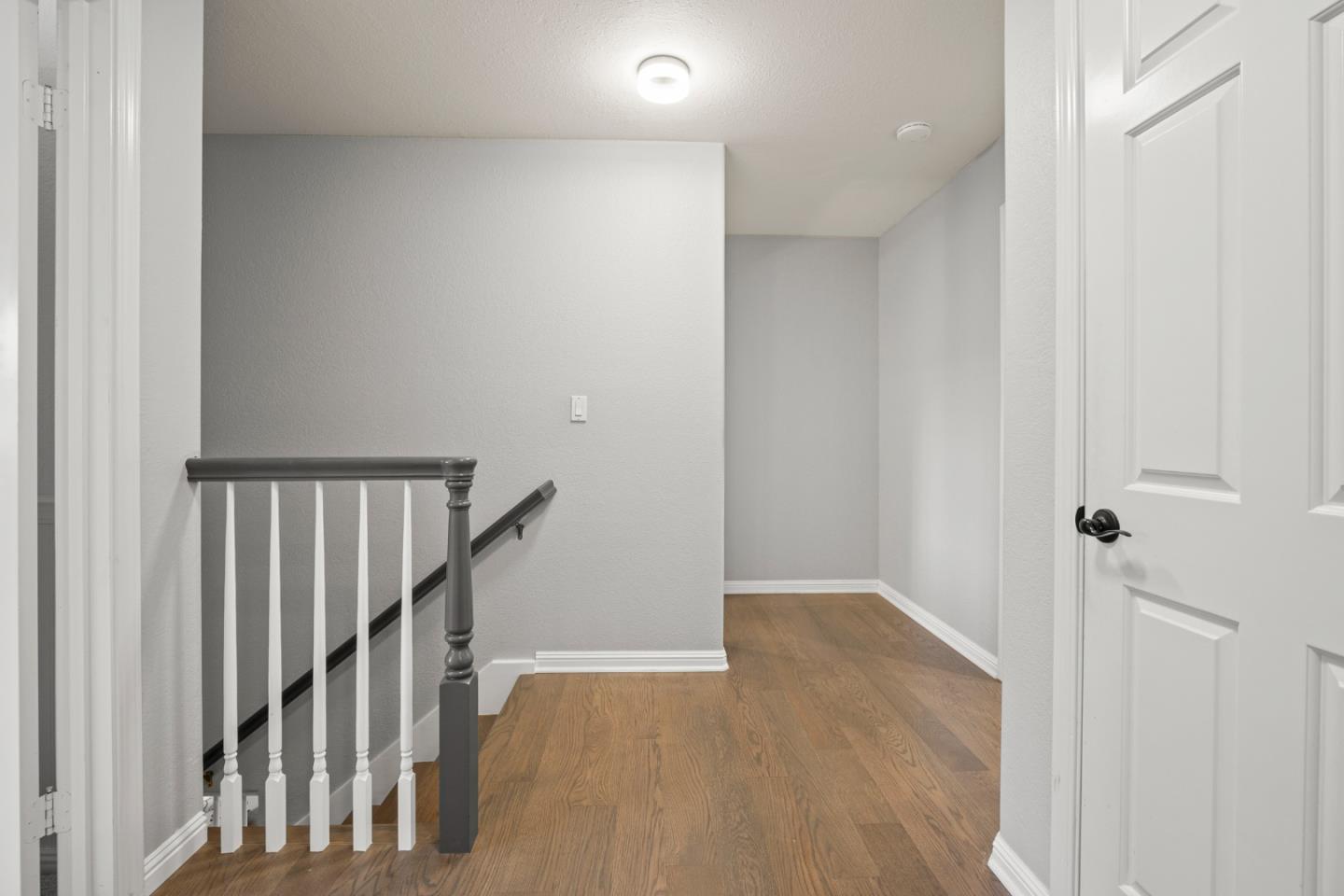 26 Seminole Court San Ramon, CA 94583 - Photo 24 of 51 a view of a hallway with wooden floor