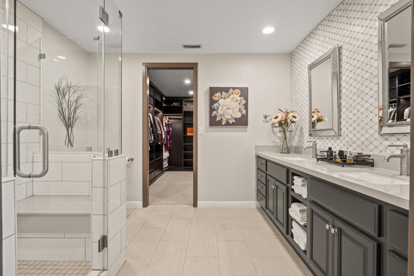 26 Seminole Court San Ramon, CA 94583 - Photo 29 of 51 a bathroom with a double vanity sink a mirror and shower