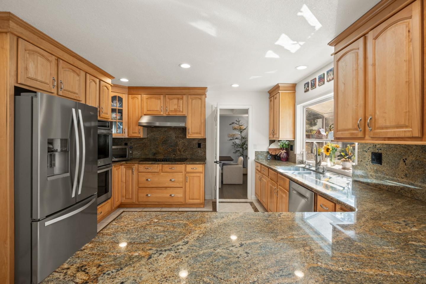 26 Seminole Court San Ramon, CA 94583 - Photo 10 of 51 a kitchen with stainless steel appliances granite countertop a refrigerator and a stove top oven