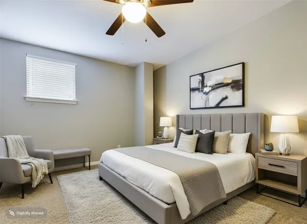 a bedroom with bed and window