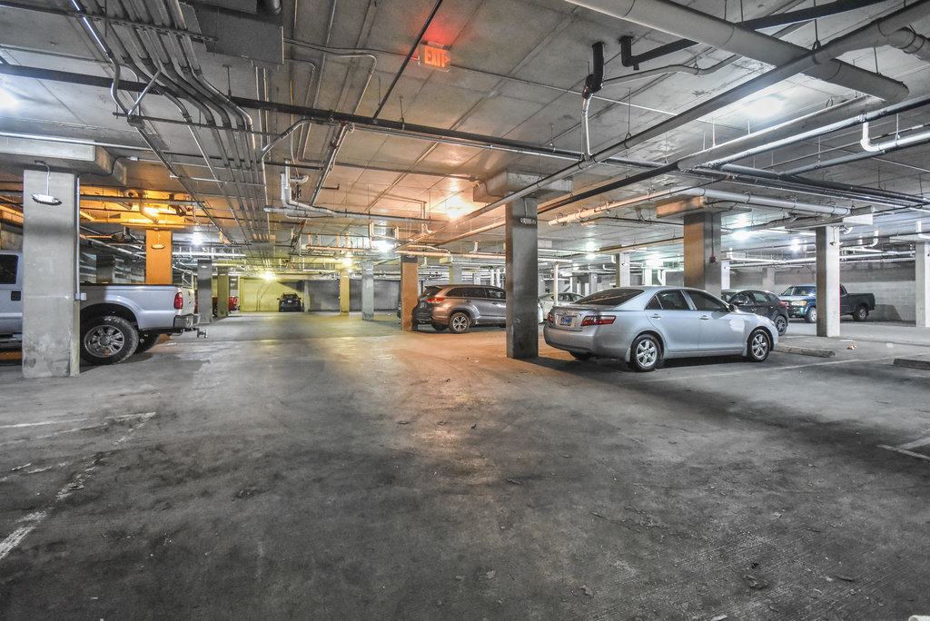2502 Leon Street, Unit 100 Austin, TX 78705 - Photo 2 of 17 a view of parking area with parking space