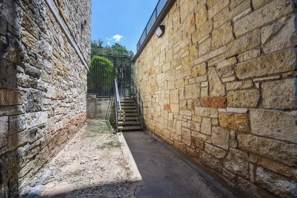 a view of a building with a street