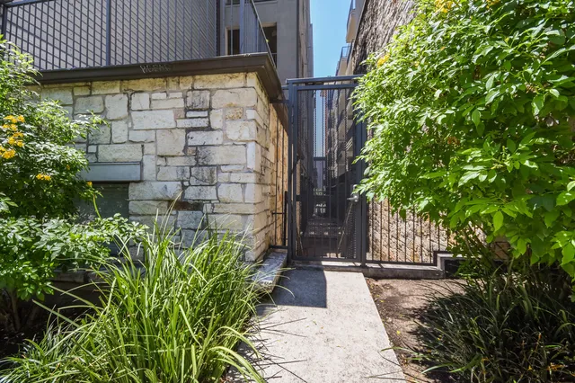 a view of a pathway with a house
