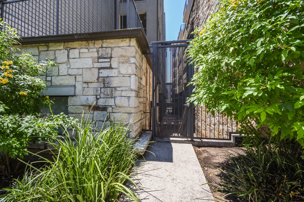 2502 Leon Street, Unit 100 Austin, TX 78705 - Photo 4 of 17 a view of a pathway with a house