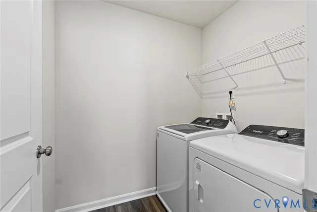 a view of storage and utility room with washer and dryer