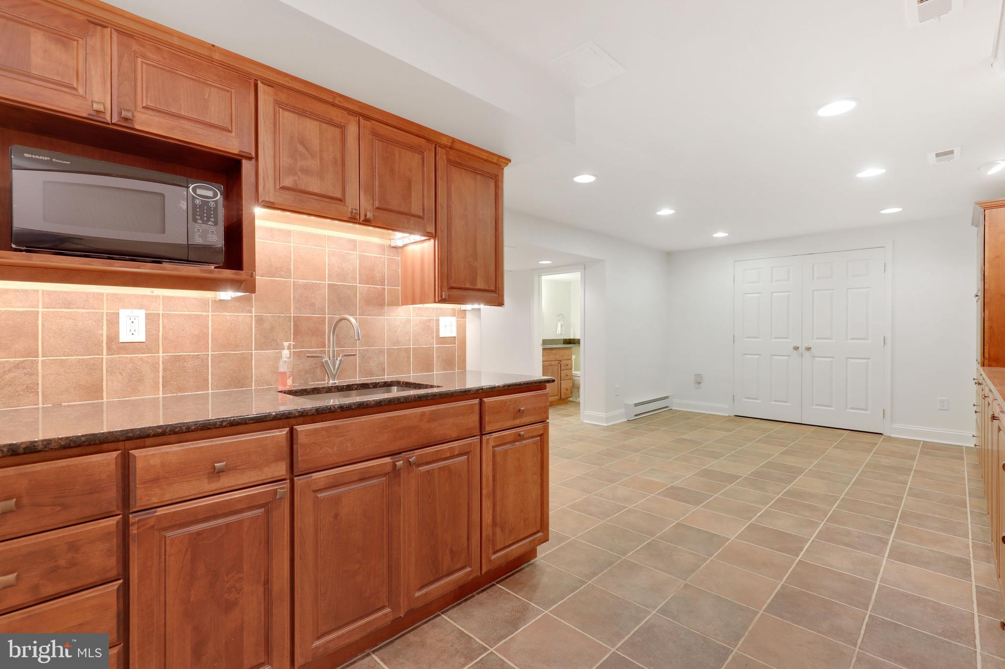 2206 Forest Ridge Road Lutherville-Timonium, MD 21093 - Photo 40 of 49 Lower Level Rec room wet bar