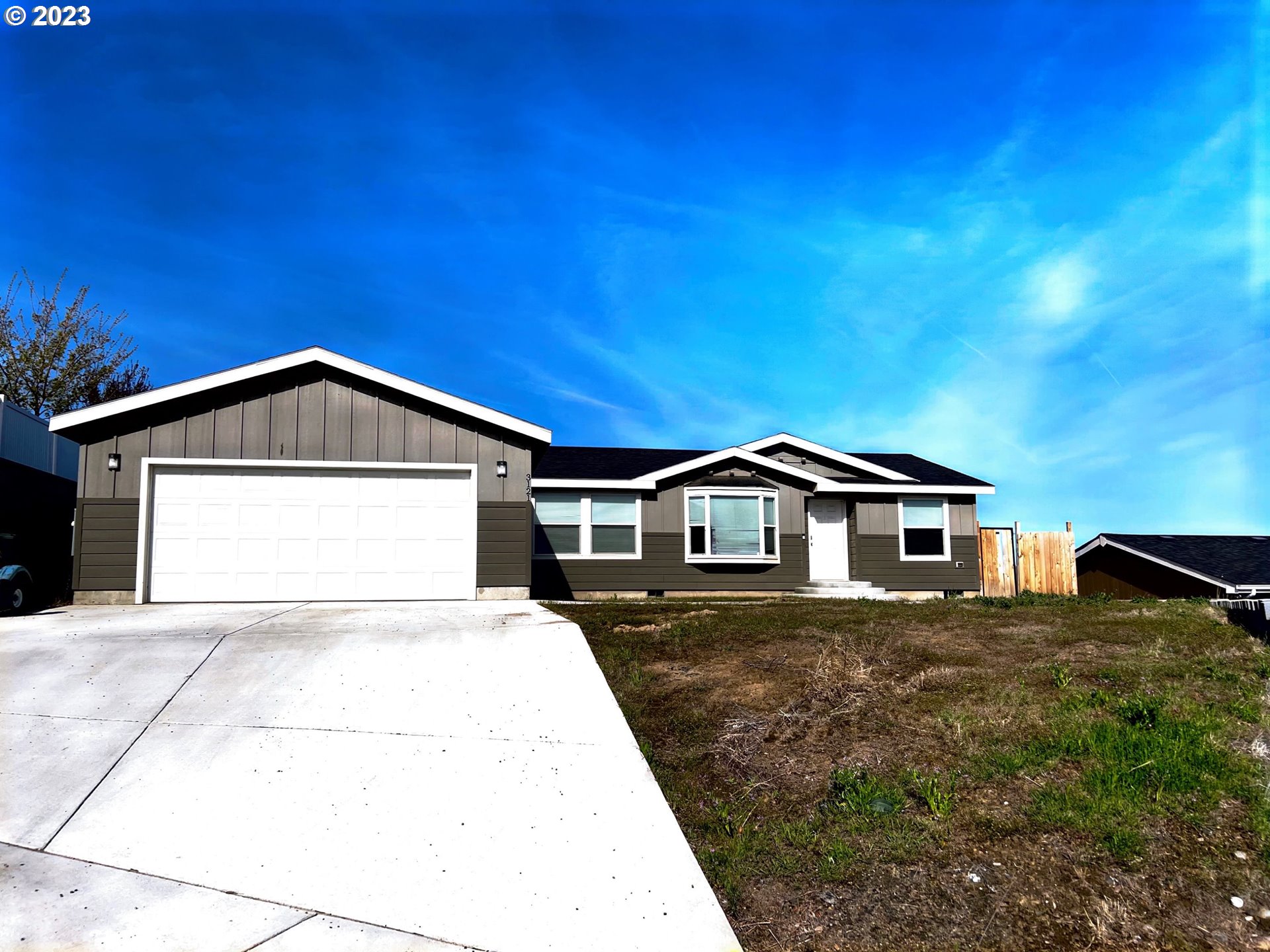 3121 Southwest River View Drive Pendleton, OR 97801 - Photo 1 of 1 a front view of a house with yard