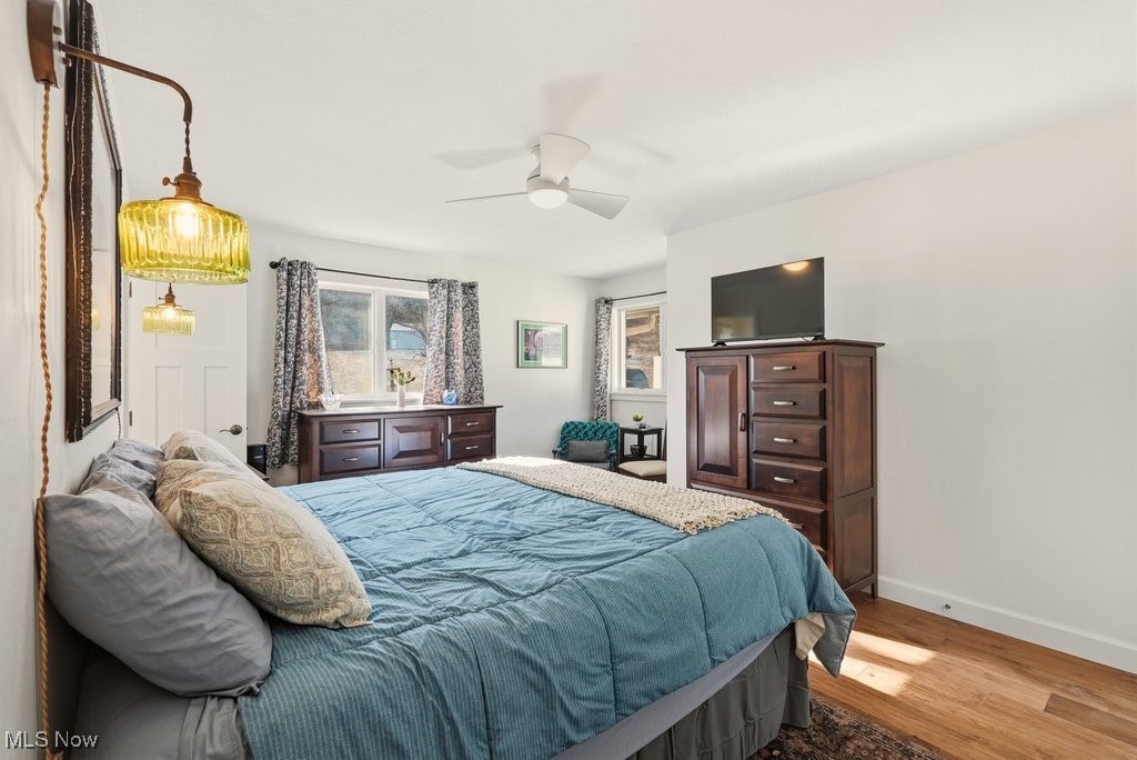 1430 Magnolia Road Southwest Dellroy, OH 44620 - Photo 26 of 50 Spacious bedroom offering comfort, natural light, and room to unwind.