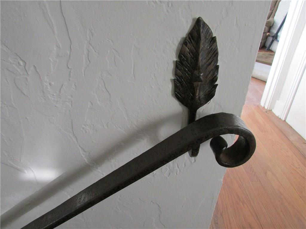 3600 West Run Road Munhall, PA 15120 - Photo 11 of 24 Small details give the home character, such as the leaf on the wrought iron railing.