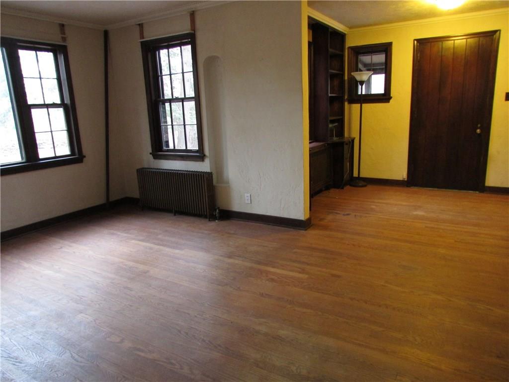 3600 West Run Road Munhall, PA 15120 - Photo 14 of 24 L-shaped Living Room with beautiful hardwood floors.