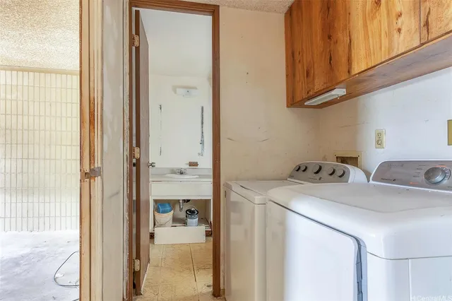 a view of a kitchen with appliances and cabinets