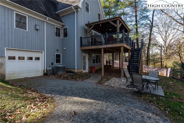 a view of sitting area with furniture and wooden floor